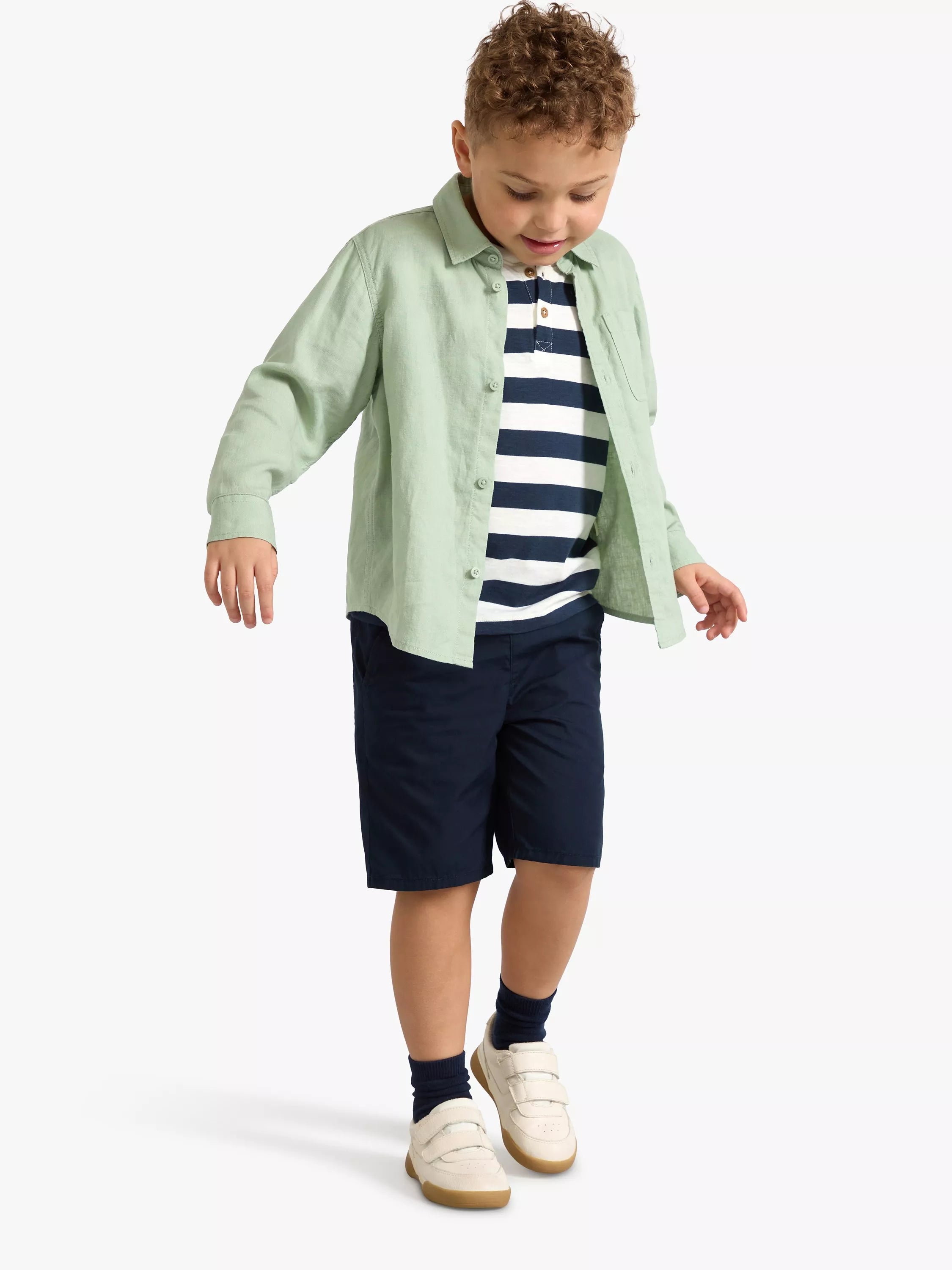 Playful Layers: The Green Linen Shirt & Striped Tee Combo